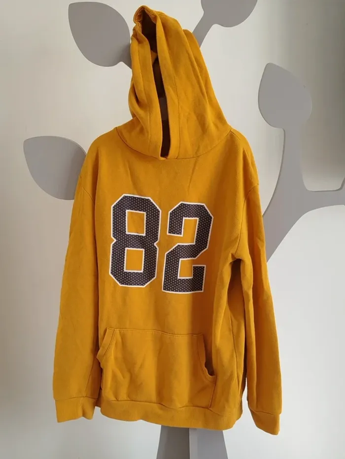 Sweat à capuche moutarde Primark taille 12-13ans