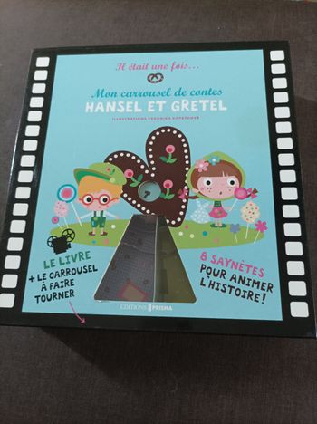 Livre + carrousel à faire tourner