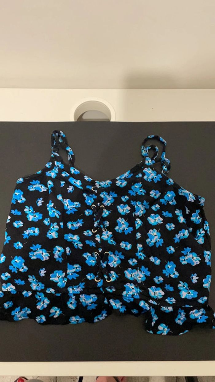 Blouse bleue marine à fleurs