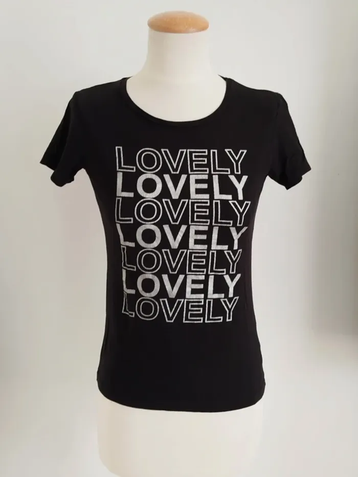 Tee-shirt manches courtes noir imprimé argenté Influx taille 16 ans