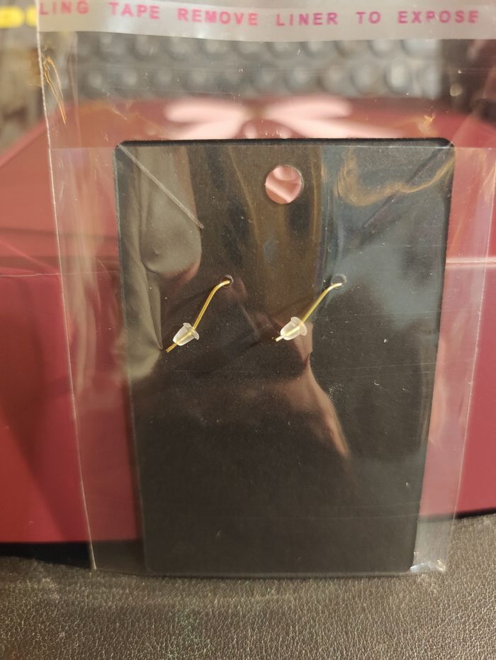 Boucles d'oreilles pendantes dorées - photo numéro 2