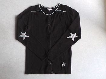 Veste noire avec étoiles argentées