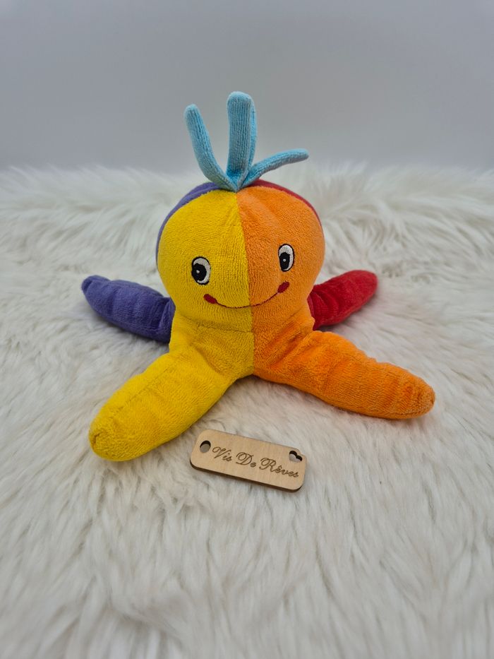 Doudou peluche Pieuvre Multicolore sourire cheveux bleu baby club Gémo