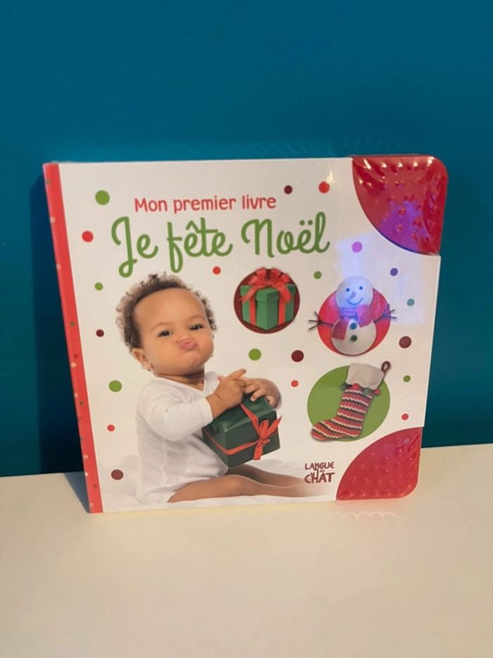 Livre bébé neuf sous blister mon premier livre je fête Noël