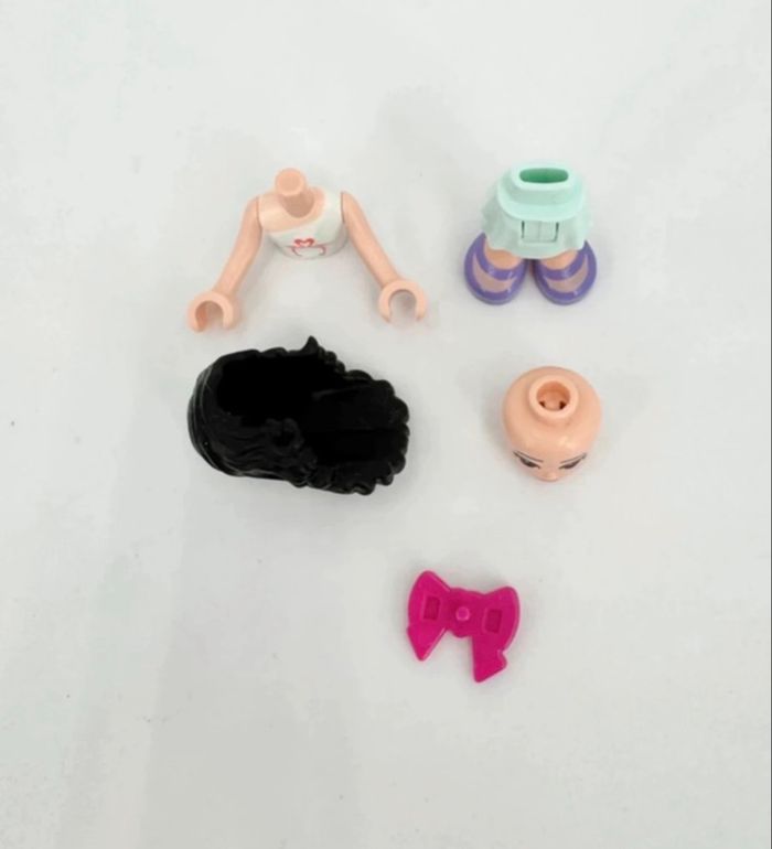 Lego Figurines Friends : Emma, noeud rose 🎀 dans les cheveux - photo numéro 5