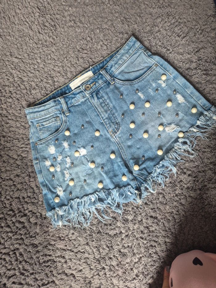 Short jeans à perles taille M