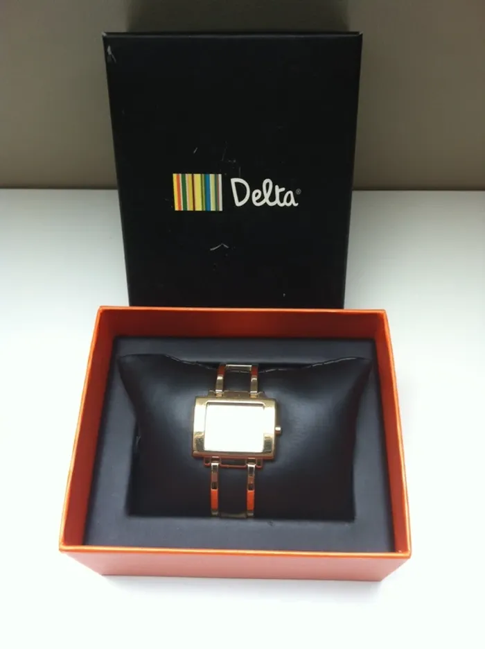Montre dorée - photo numéro 3