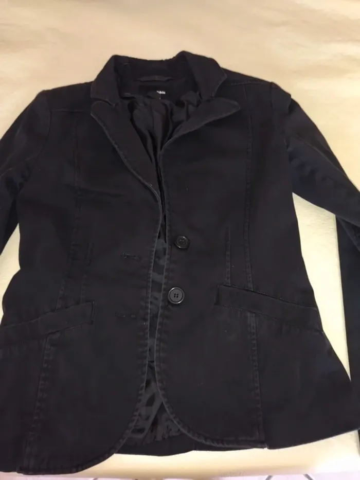 Veste H&M. Taille 34. Tbe