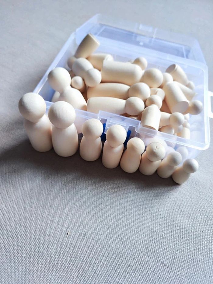 Boîte de 50 poupées en bois - photo numéro 9