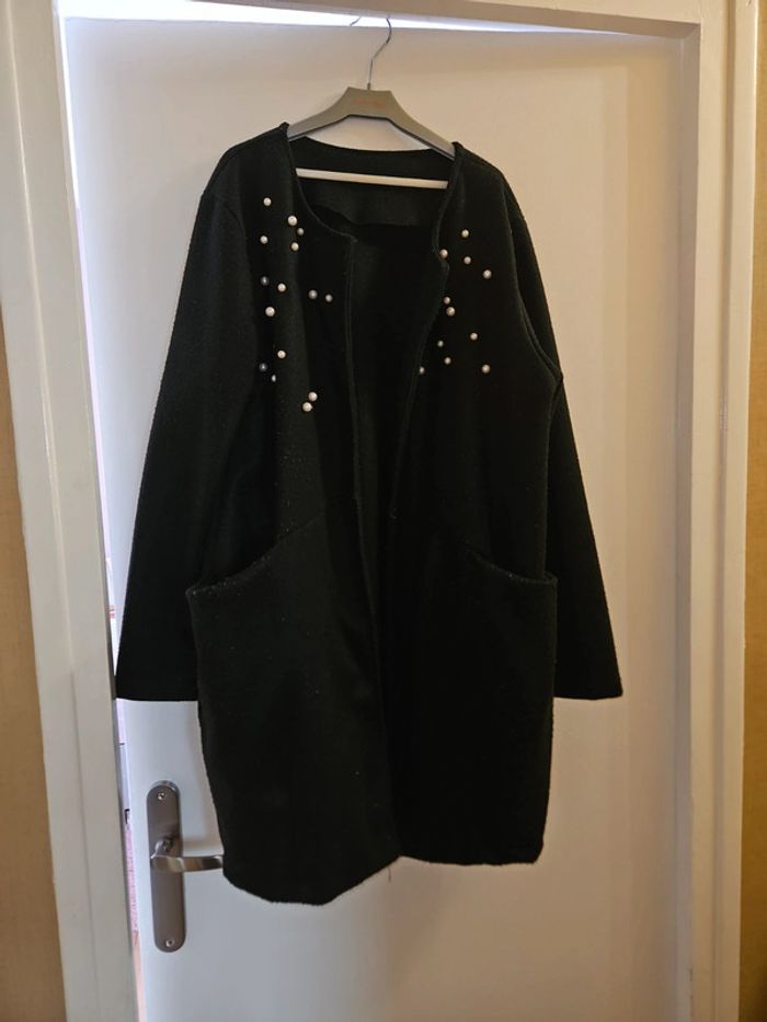 Veste à perles
