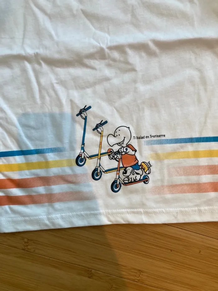 8 ans - T-shirt manches courtes  - neuf - inscription Ti balad en Trottinette - photo numéro 3