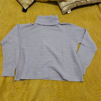 Pull col roulé taille 14ans