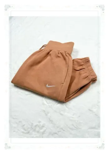 Nike jogging taille haute coupe large orange claire femme taille XS coton