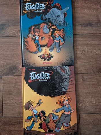 Lot  de  2 bandes  dessinées  Fugitifs