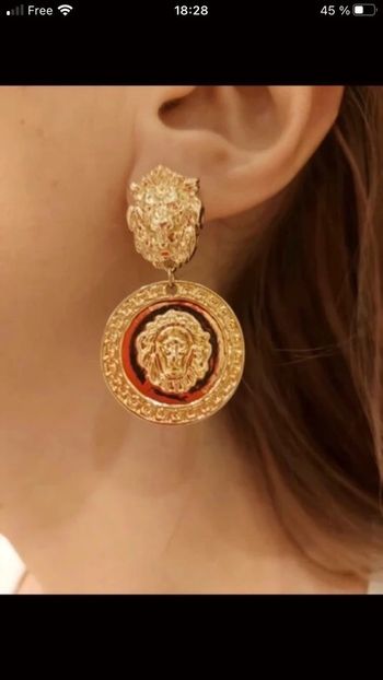 Boucles oreilles lion