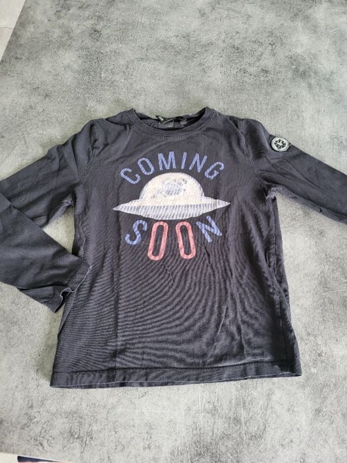 Tee-shirt coming
