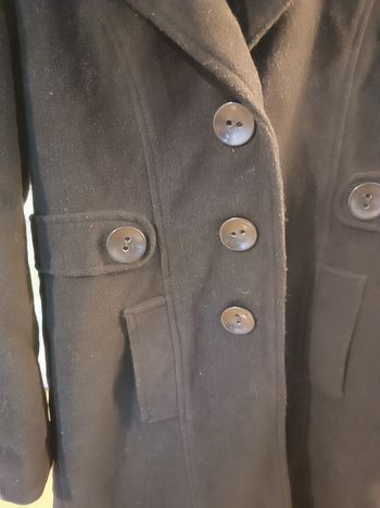 Manteau noir à bouton