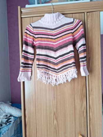 Pull col roulé à franches