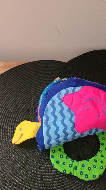 livre tissu éveil escargot