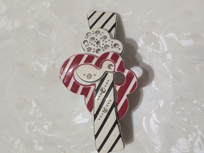 Belle barrette vintage à rayures.