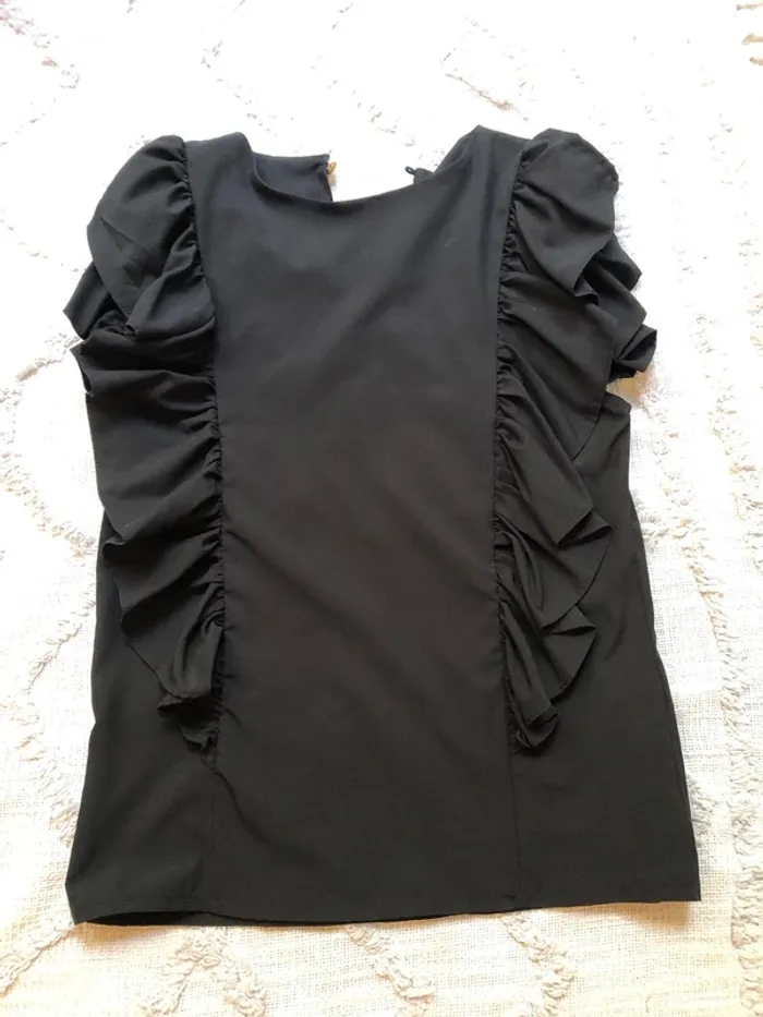 Blouse à volants taille 36 noir