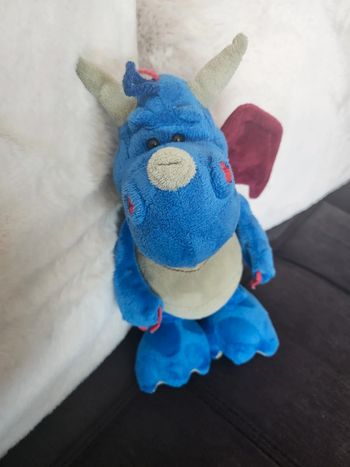 Peluche dinosaure bleue En très bon etat