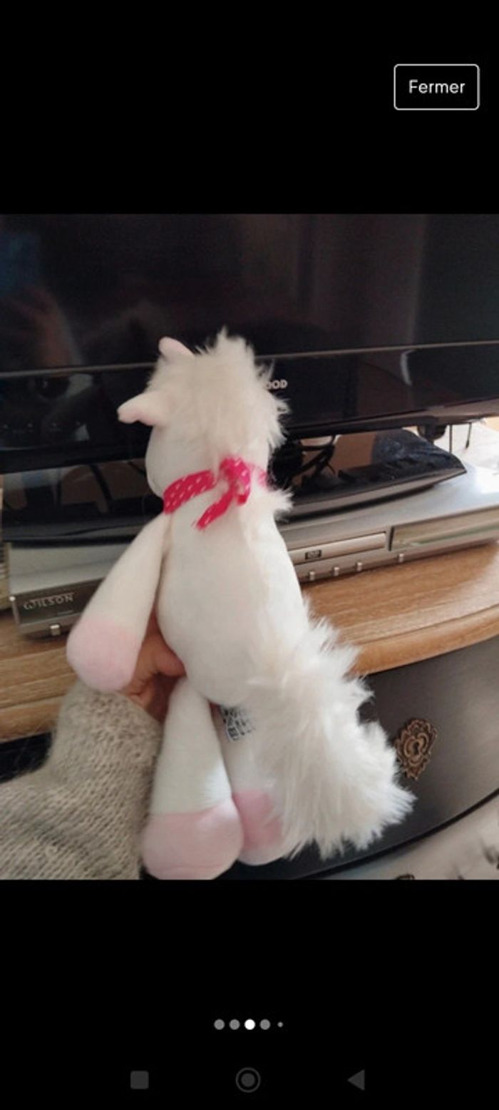 Peluche licorne Kinder rose et blanche - photo numéro 3