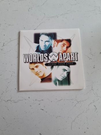 cd single 2 titres Worlds Apart "Close Your Eyes"