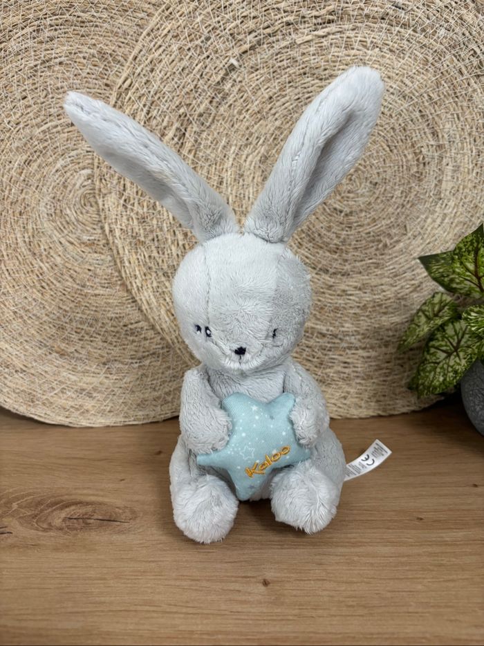 Doudou lapin gris étoile bleu musical kaloo