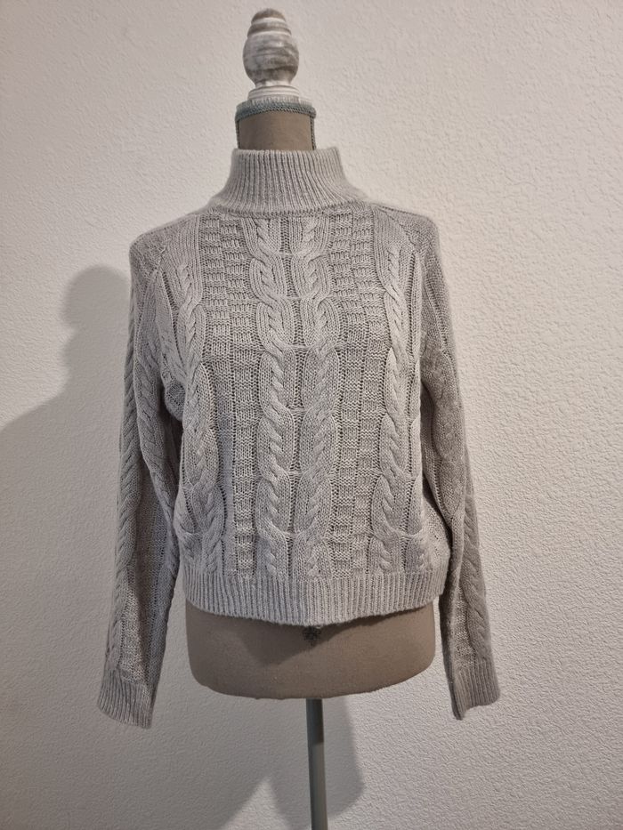 Pull col roulé