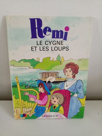 Rémi le cygne et les loups G.P rouge et or