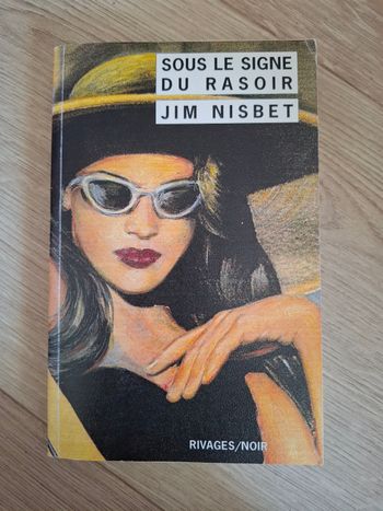 Roman Sous le signe du rasoir de Jim Nisbet en bon état 