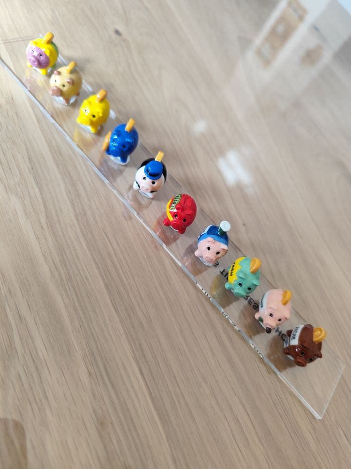 Lot de 10 figurines en céramique " les tirelires cochons"
