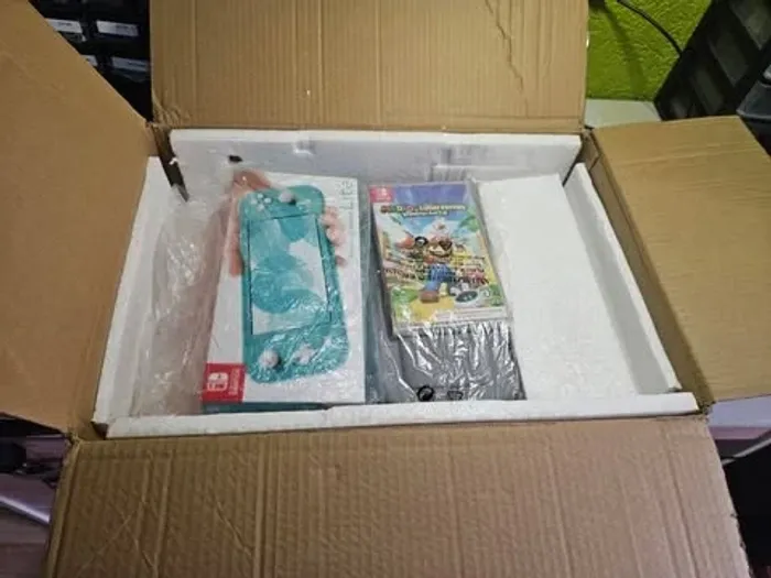 Pack Noël 🎁 Switch Lite (open-box) + Mario & Lapins Crétins NEUF + microSD 64 Go + Housse - photo numéro 6