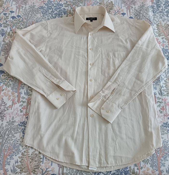 Chemise manches longues Nino Piatti taille 4 en très bon état