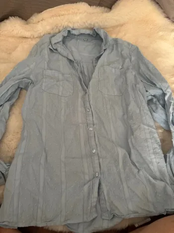 Blouse bleue taille 46 mais taille petit