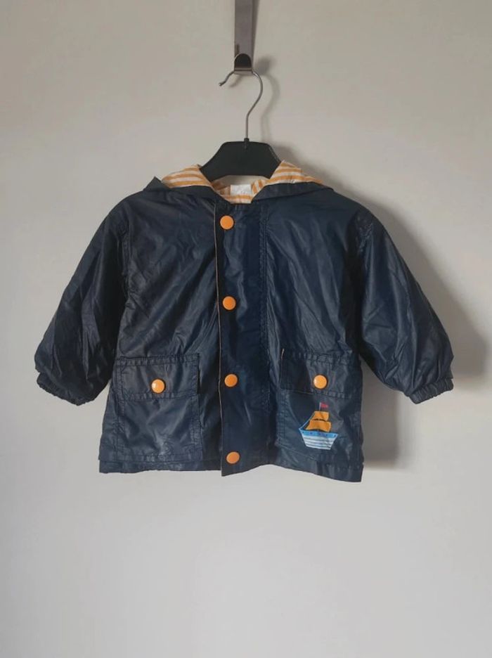 Imperméable capuche bleu marine jaune