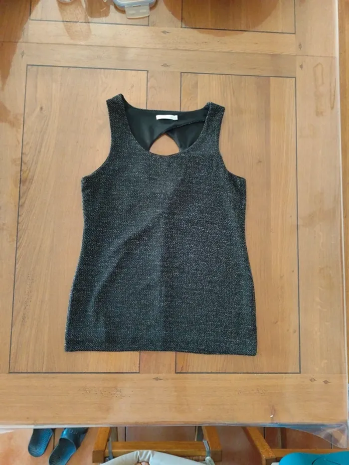 Vends petit haut scintillant