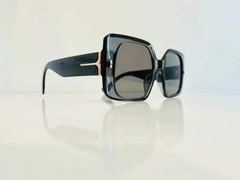 Lunette de soleil femme grise transparente rectangulaire UV protection catégorie 2