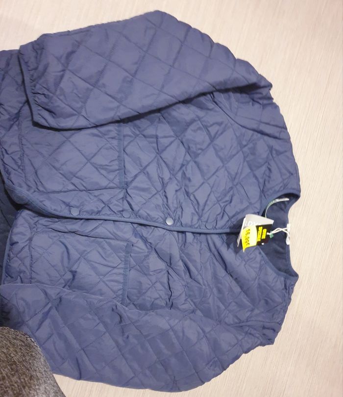 Manteau neuf encore étiqueté