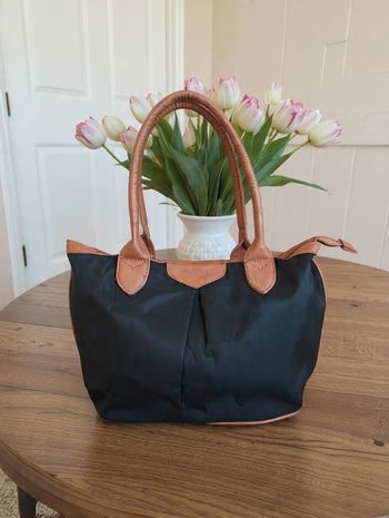 sac à mains noir de la marque C&A en toile et simili cuir