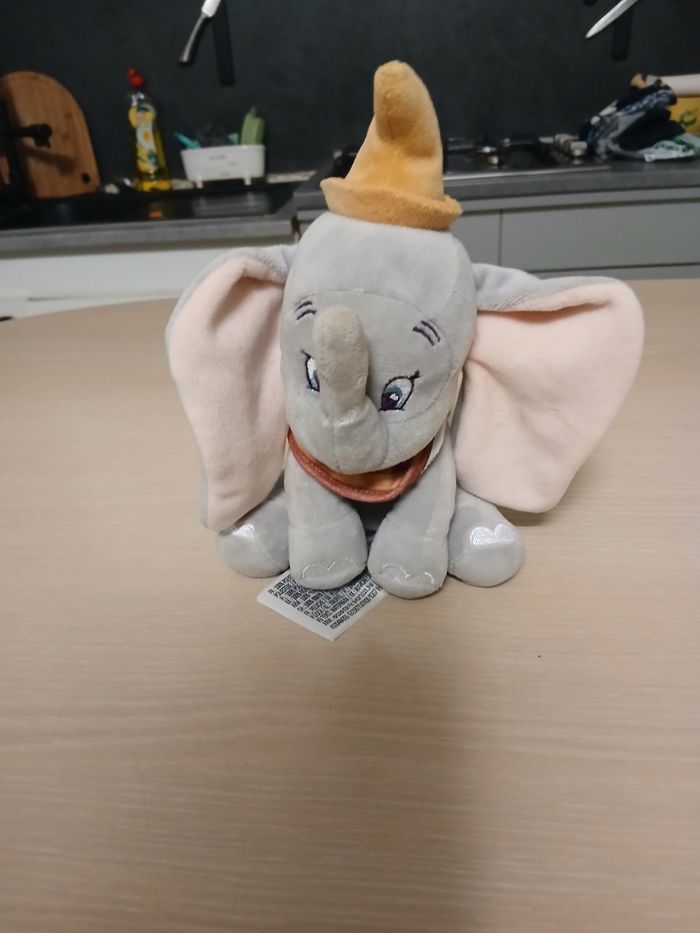 Peluche disney 12cm matiere polyster  couleur gris,rose,moutarde - photo numéro 6