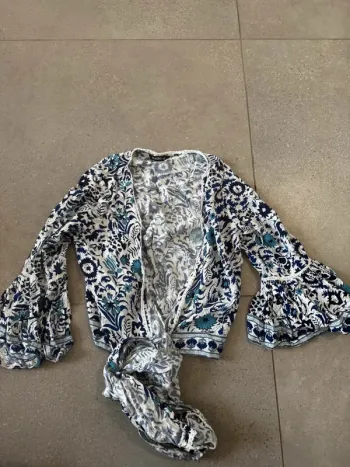 Haut bleu et blanc Zudio taille XS, très bon état