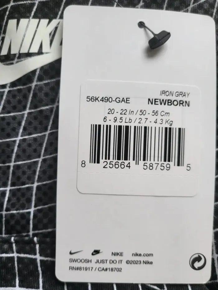Combi court Nike Neuf taille 50 56cm gris - photo numéro 2