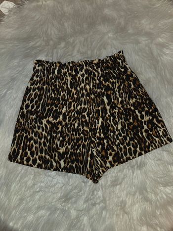 Short fluide kiabi léopard taille xs tres bon état 