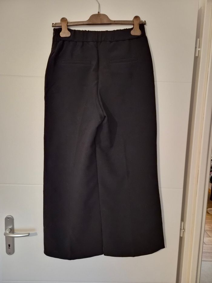 Pantalon jalbes larges a boutons dorés - photo numéro 4