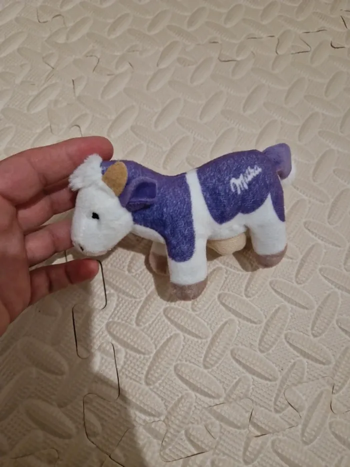 Peluche Milka vache mini violet blanc Très bon état