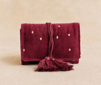Mini pochette bijoux bordeaux à pois dorés