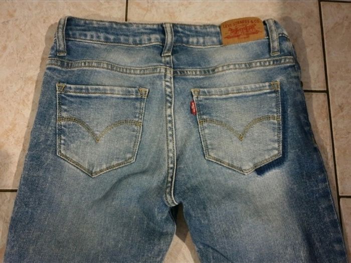 Jeans levi's 711 taille 14 ans