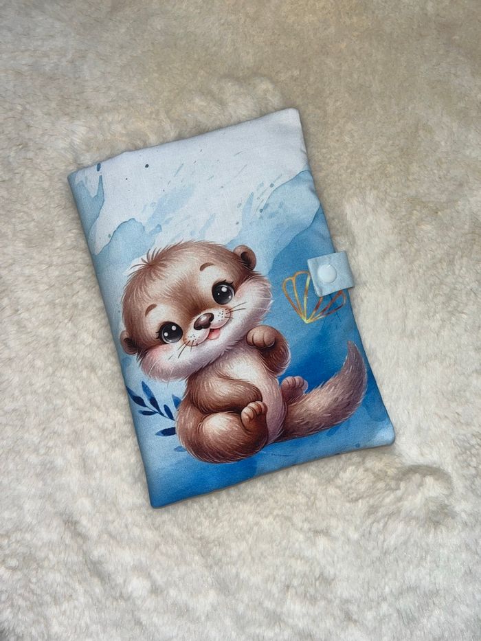 Protège carnet de santé loutre bleu - photo numéro 2